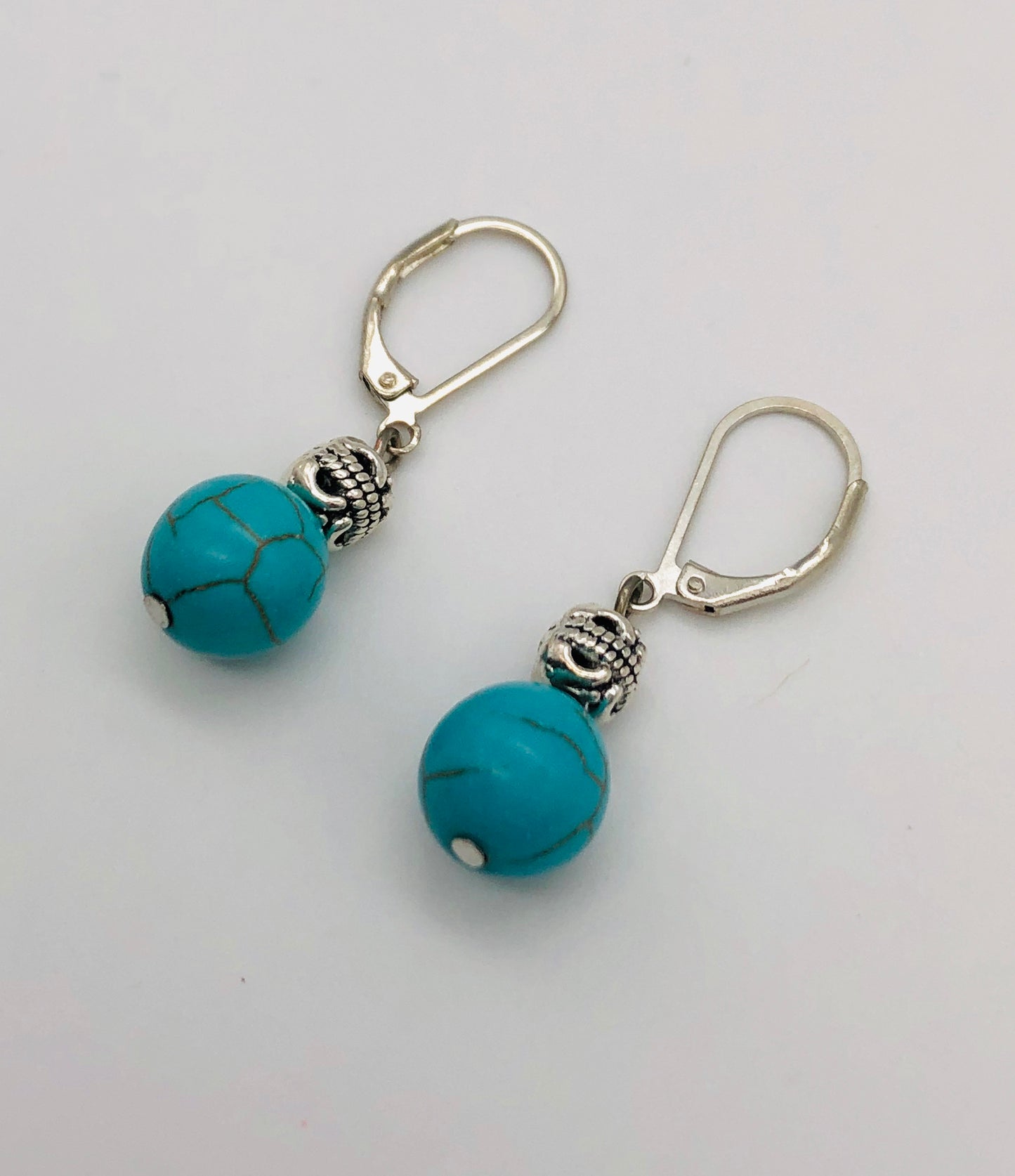 Silver with round turquoise bead earrings