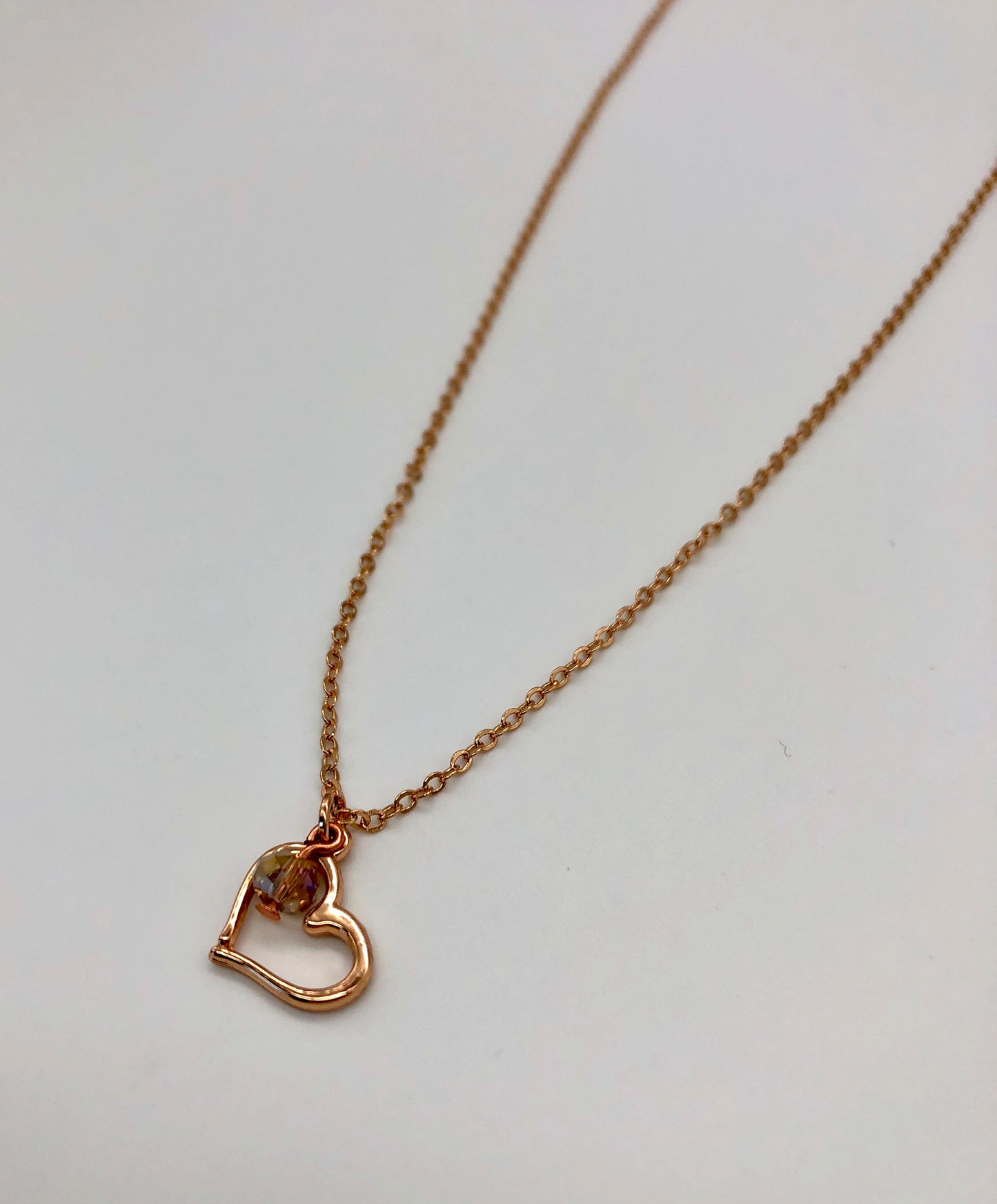 Rose gold plated chain with open heart charm and bead accent necklace