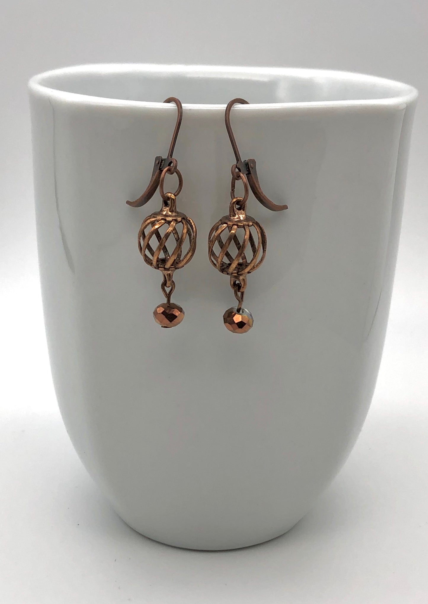 Oxidized copper curve ball earrings