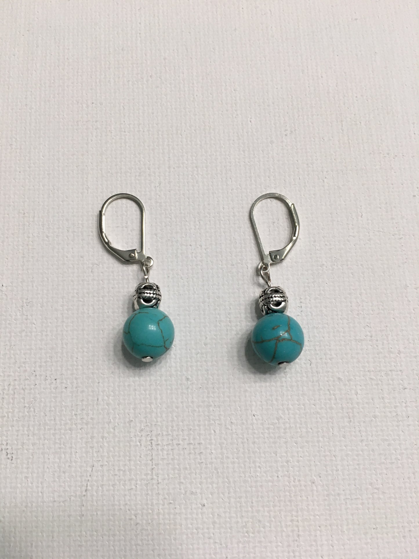Silver with round turquoise bead earrings