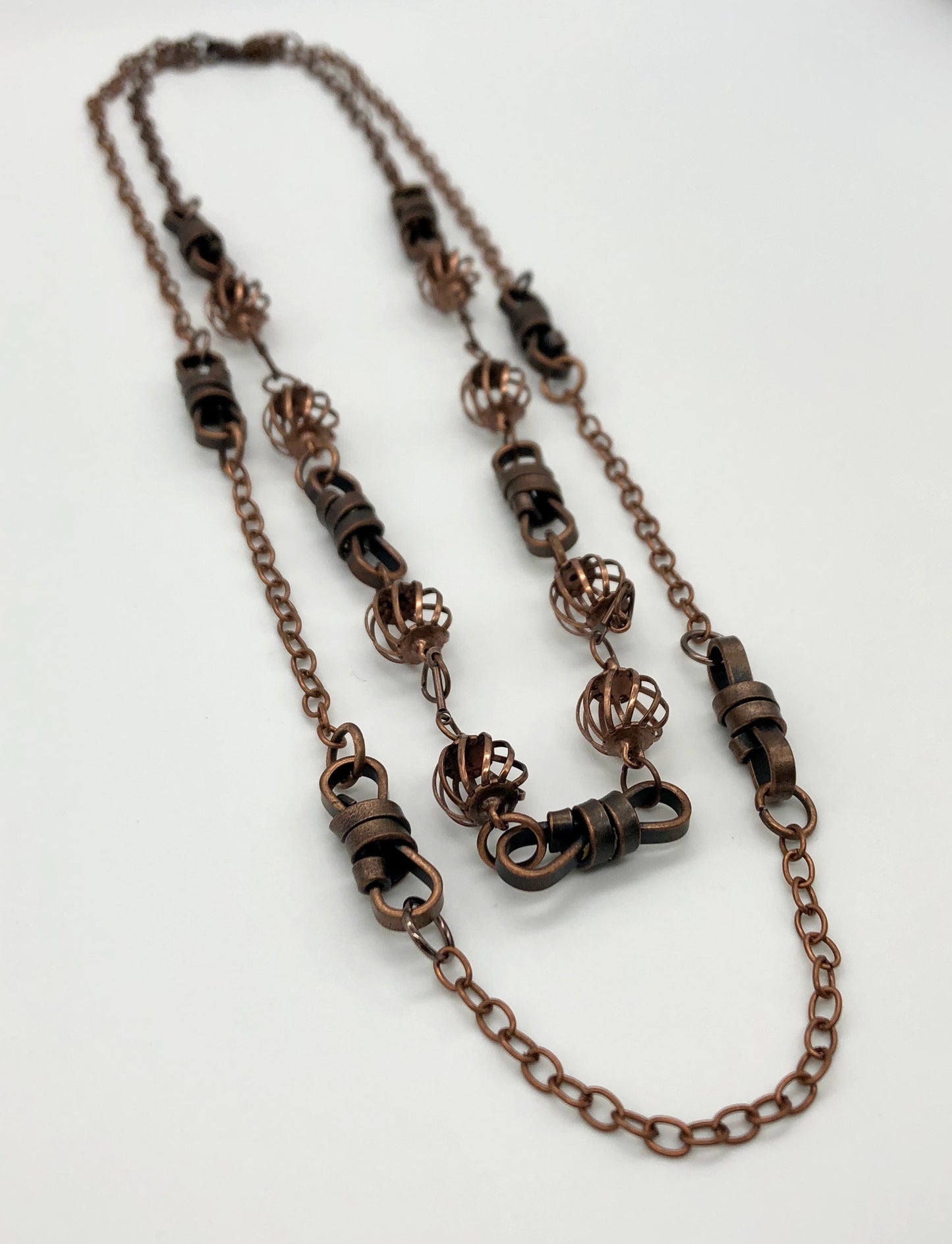 Oxidized copper two-strand chain with rope and curve ball detail necklace