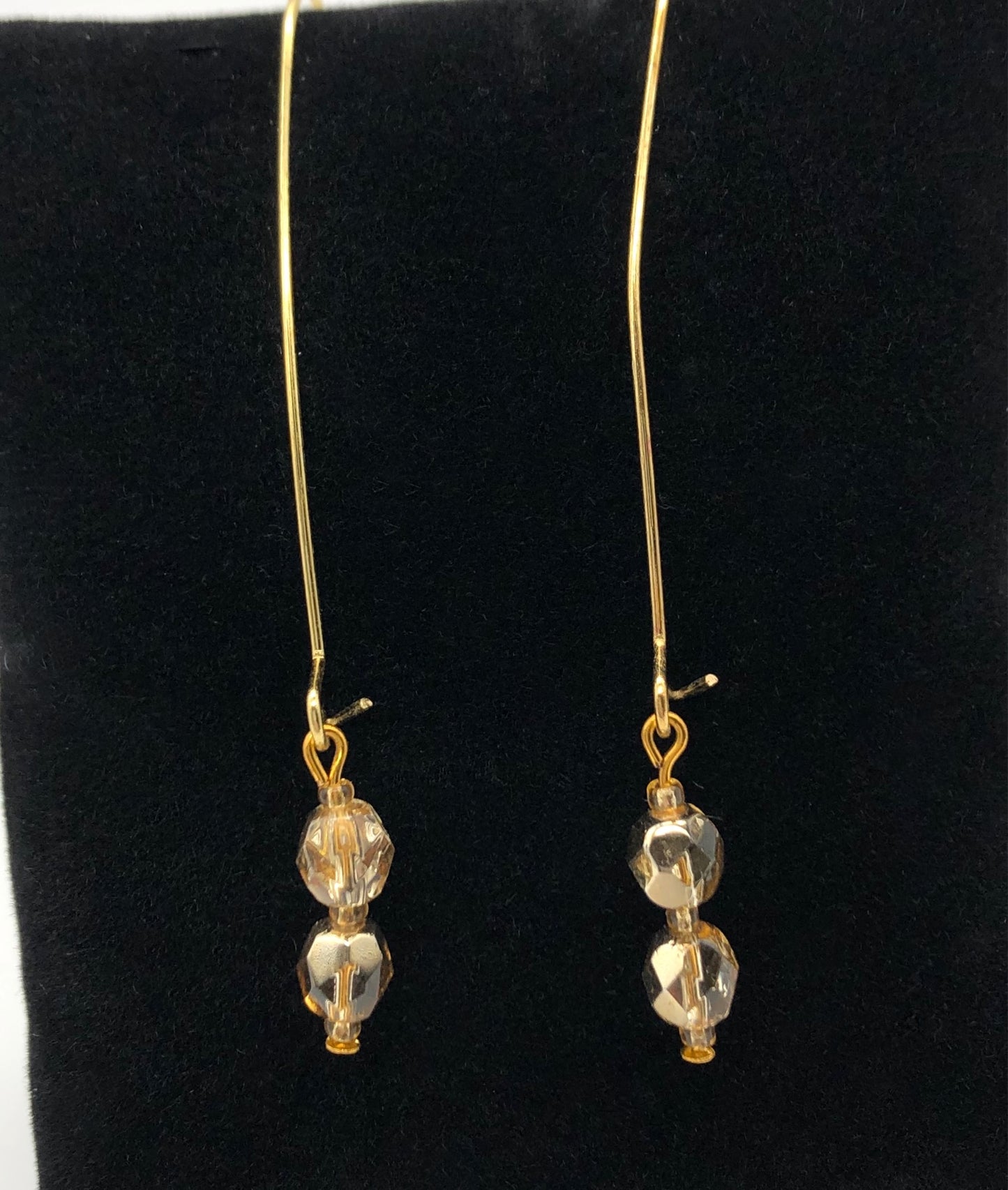 Gold large loop kidney earrings