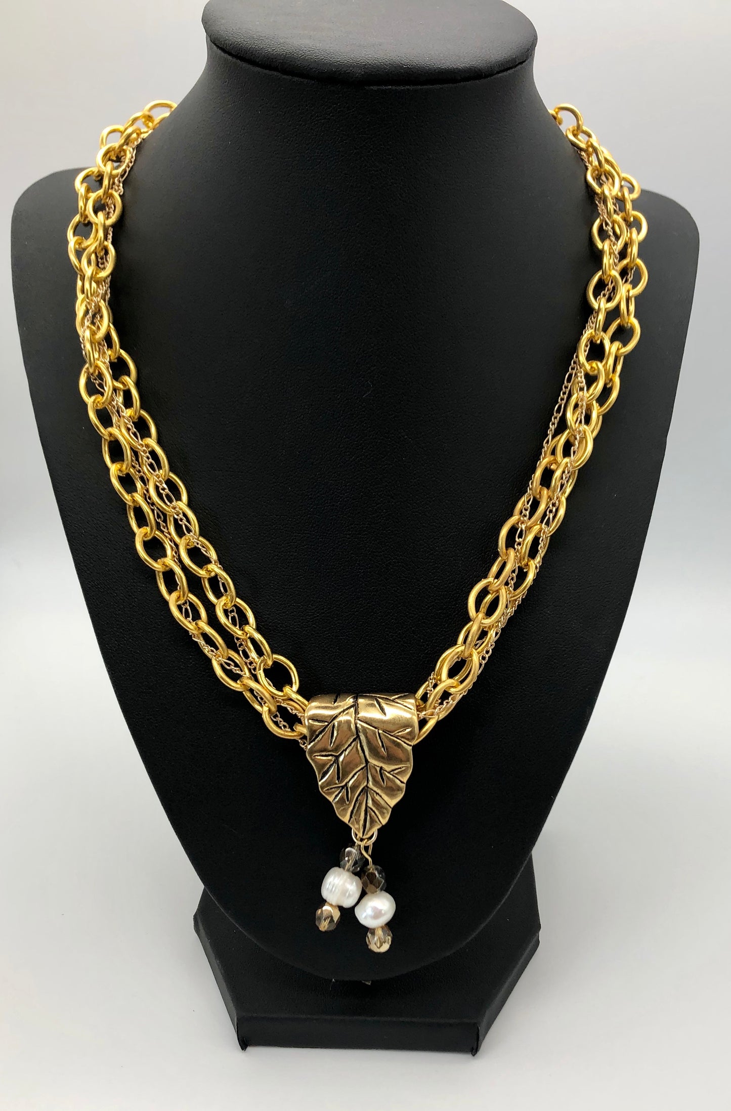 Gold plated large chain with leaf bail and freshwater pearl glass bead detail necklace