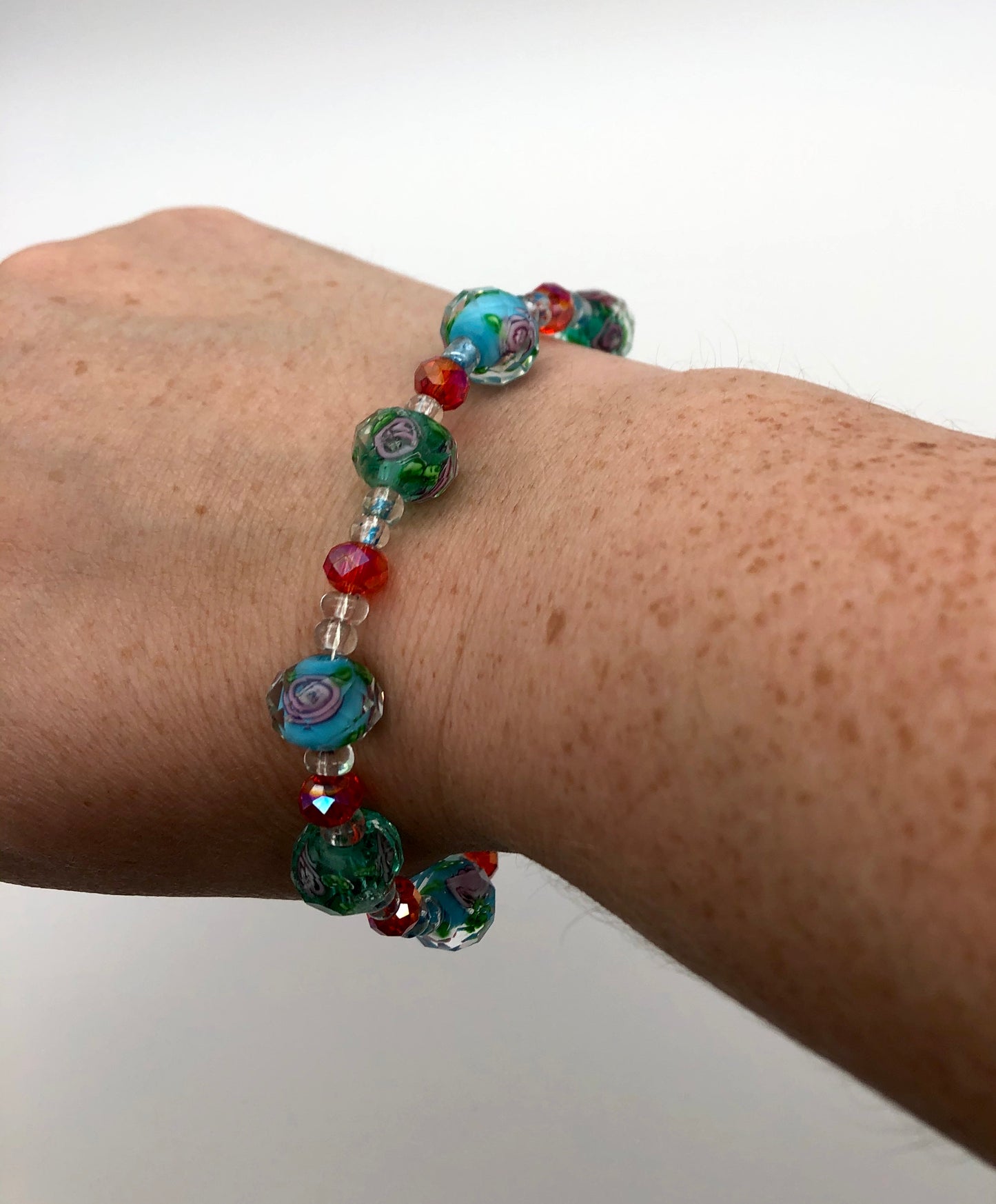 Lampwork blue and pink bead with rose detail bracelet