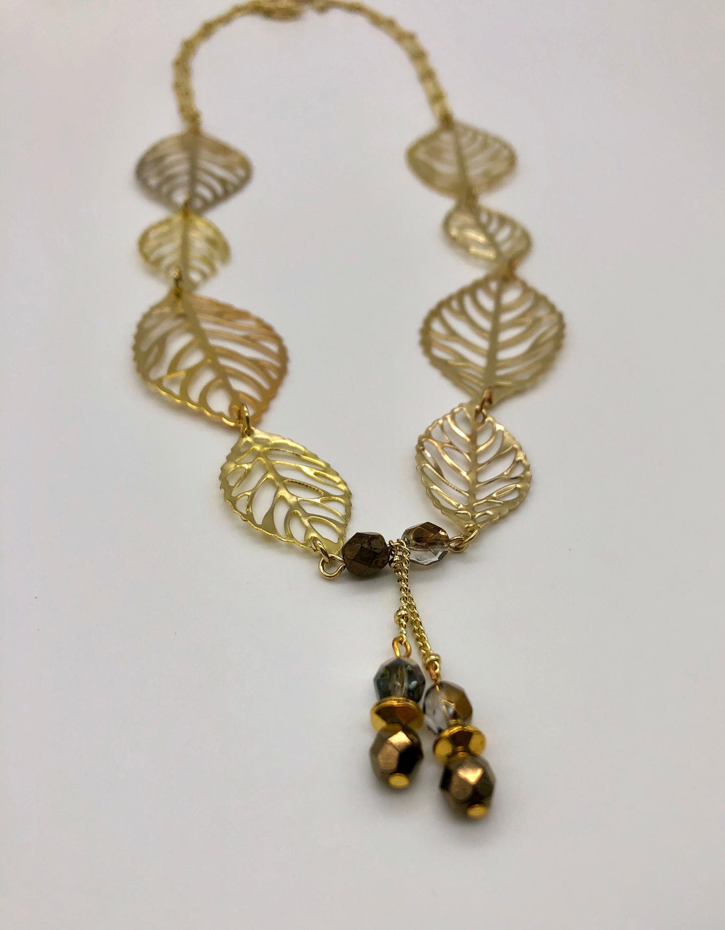 Gold leaf with dangle and double gold ball chain necklace
