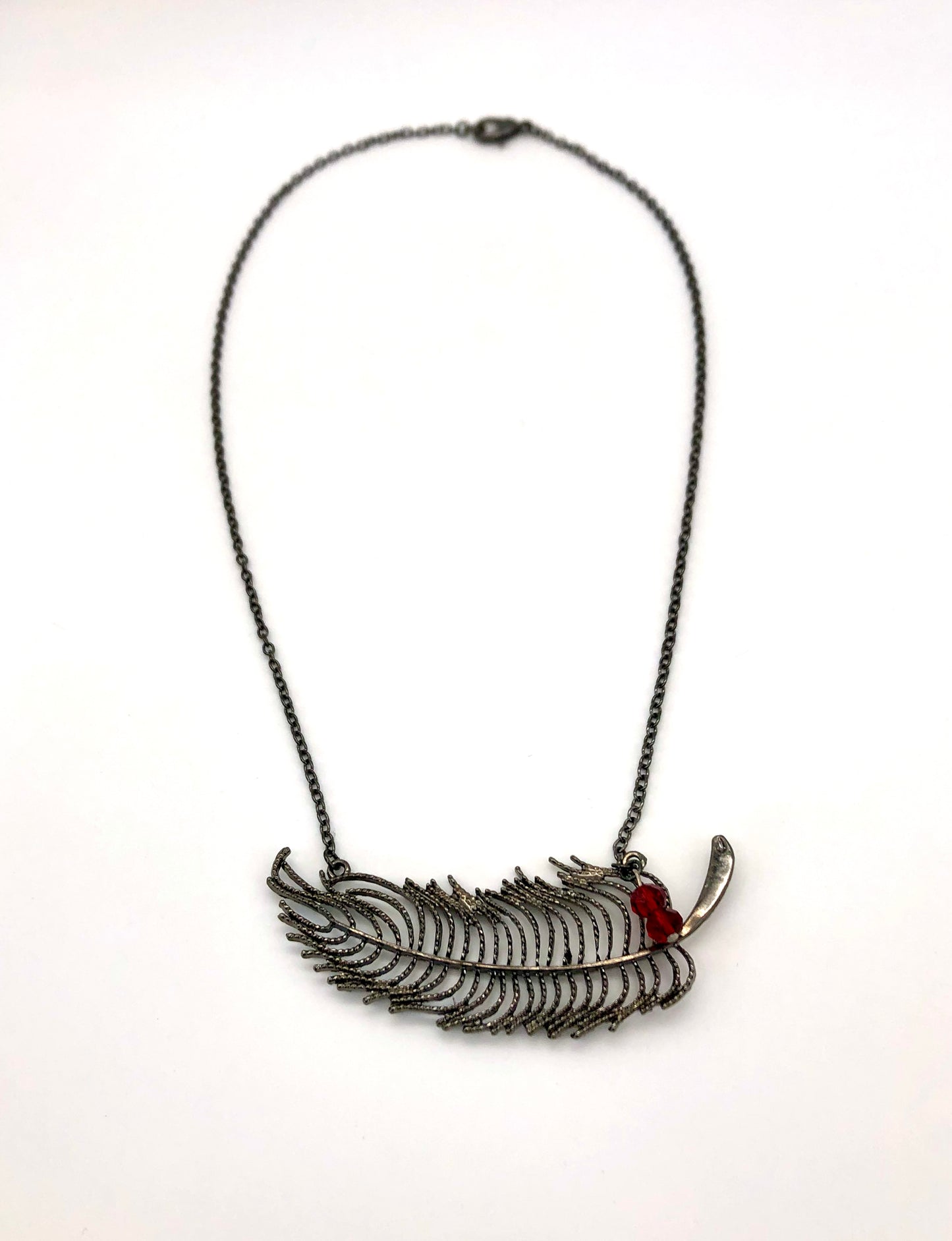 Feather necklace with red bead accents