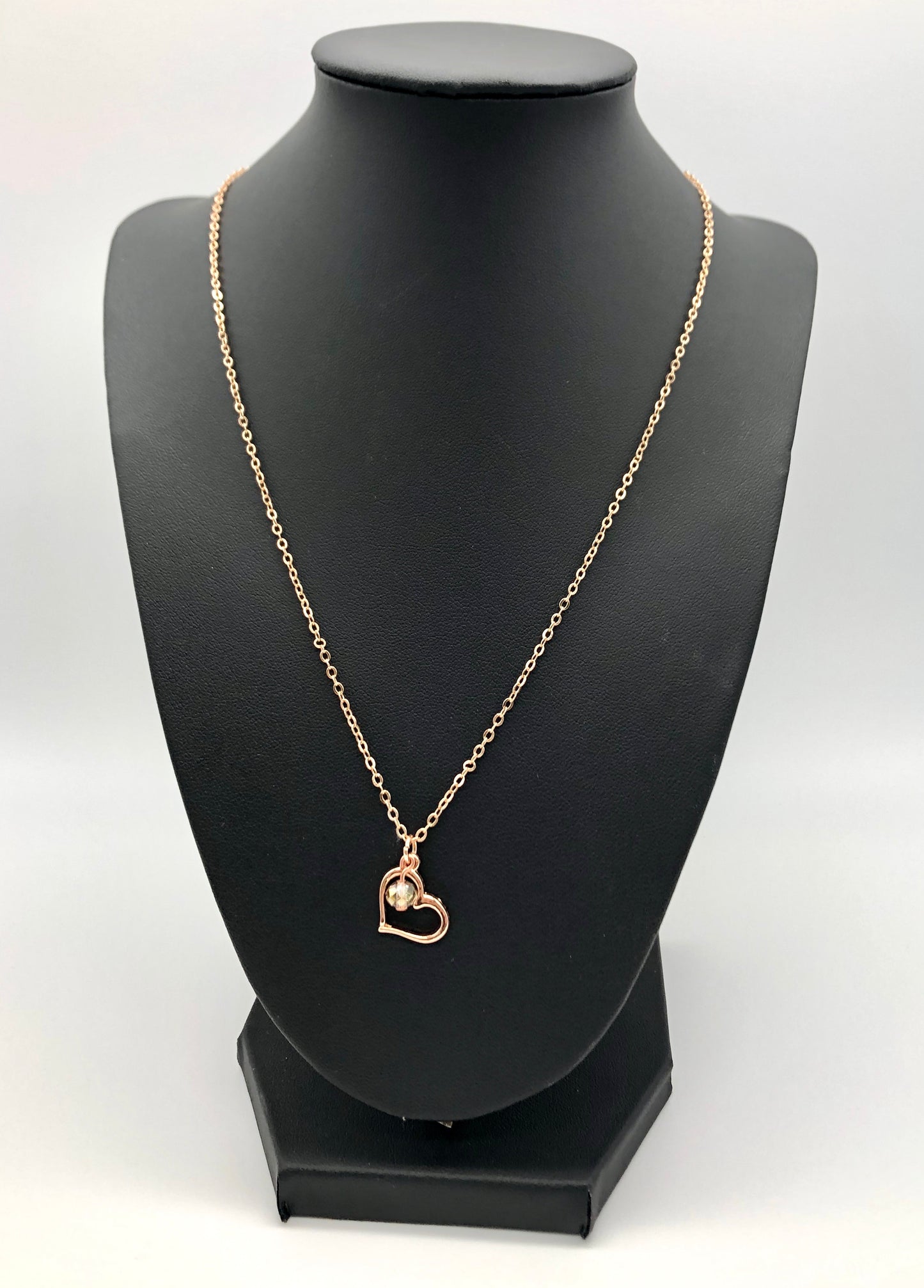 Rose gold plated chain with open heart charm and bead accent necklace