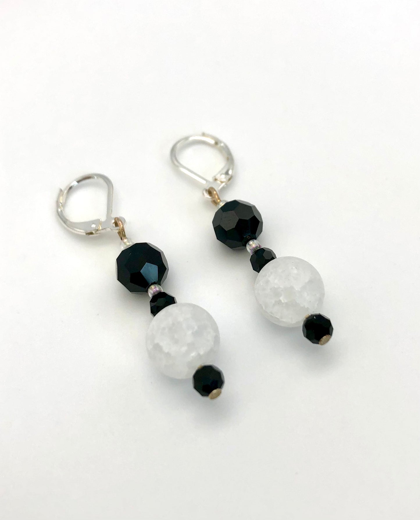 Black faceted and white crackle bead earrings