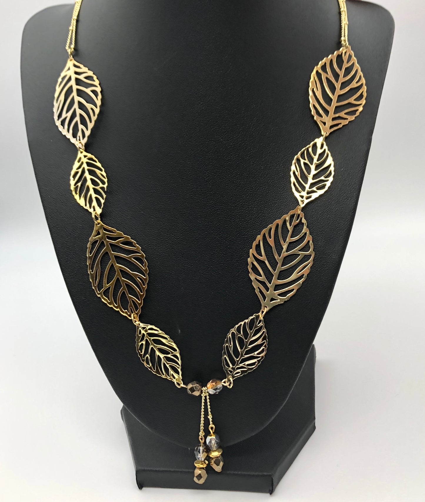 Gold leaf with dangle and double gold ball chain necklace