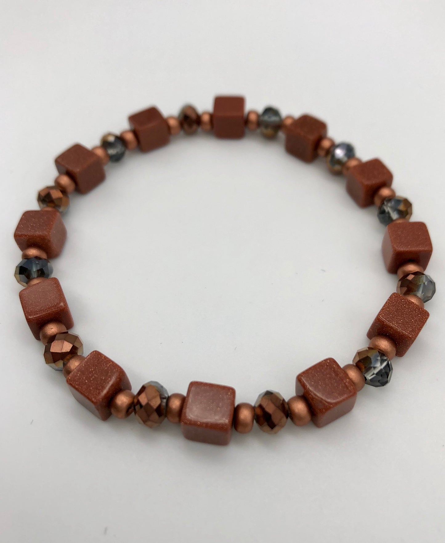 Goldstone and amber bead stretch bracelet