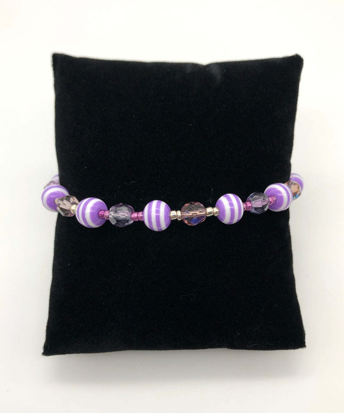 Purple faceted and purple with white stripes memory wire bracelet
