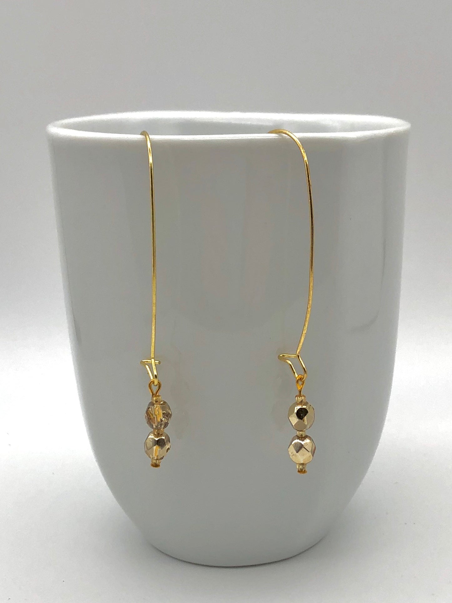 Gold large loop kidney earrings