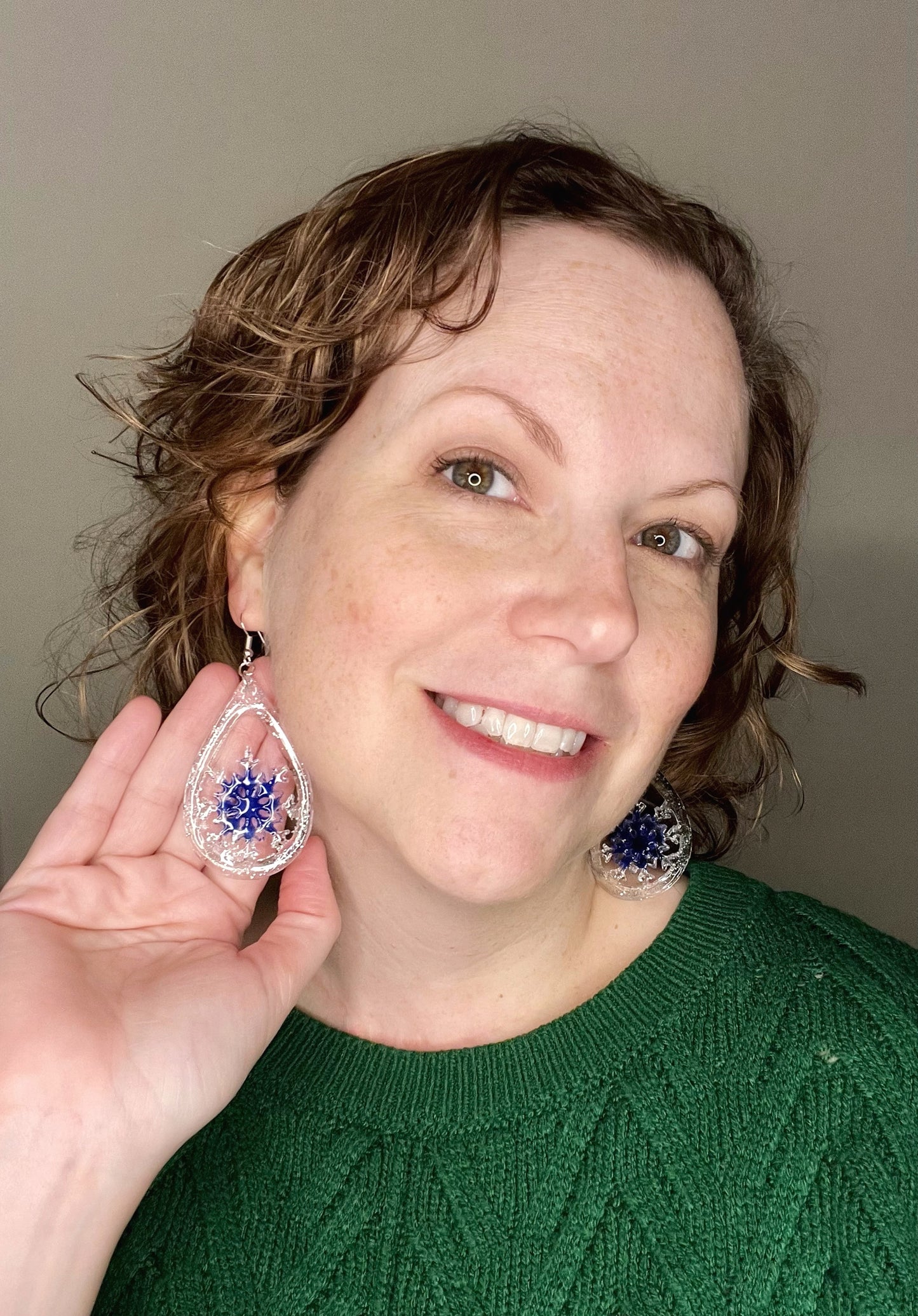 Resin snowflake teardrop shape earrings