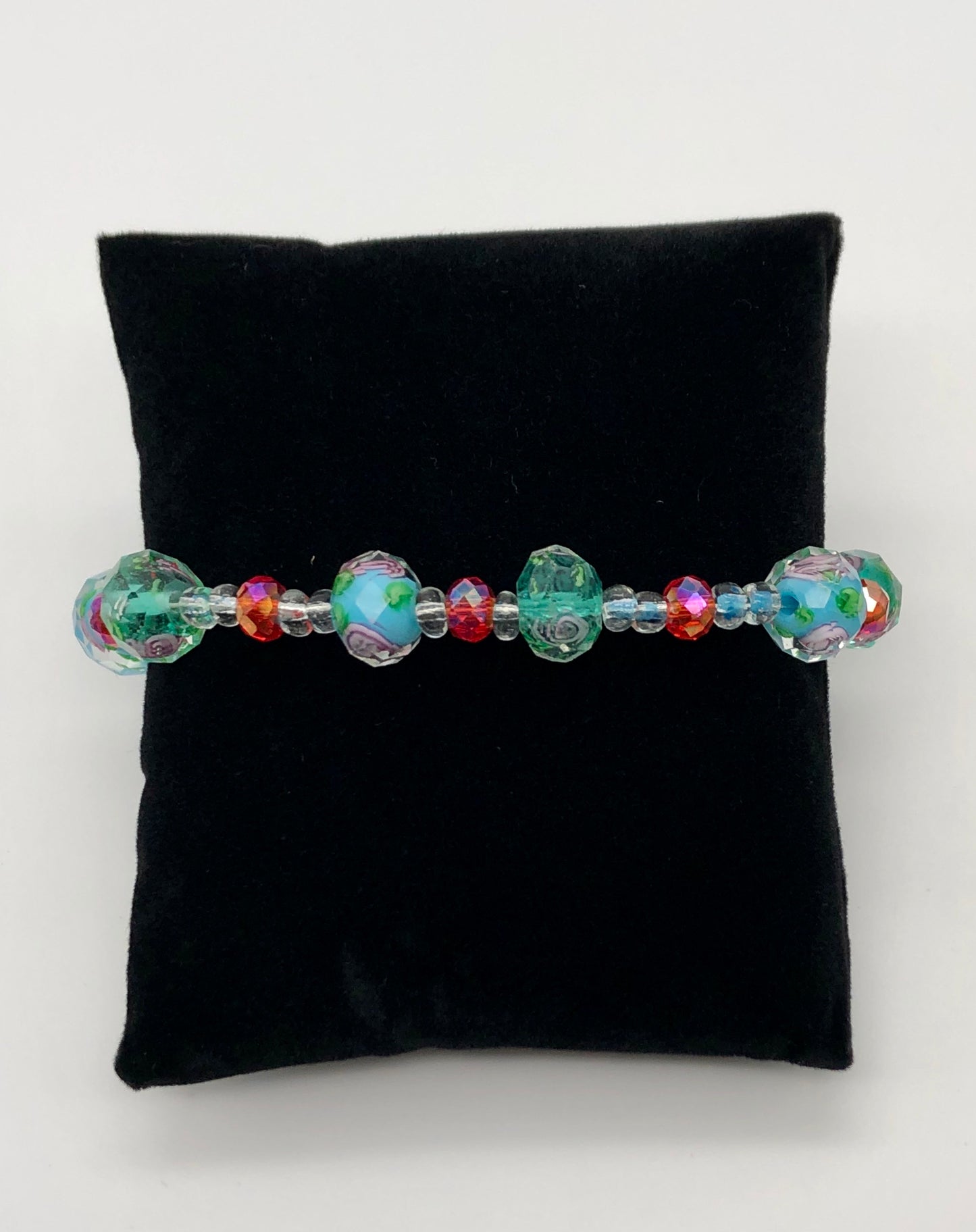 Lampwork blue and pink bead with rose detail bracelet