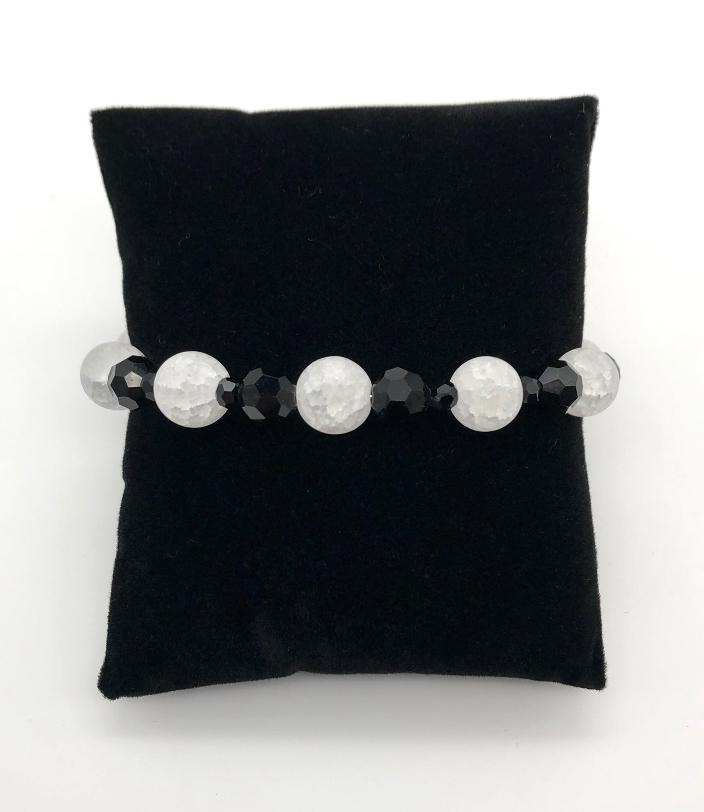 Black faceted bead and white crackle bead memory wire bracelet