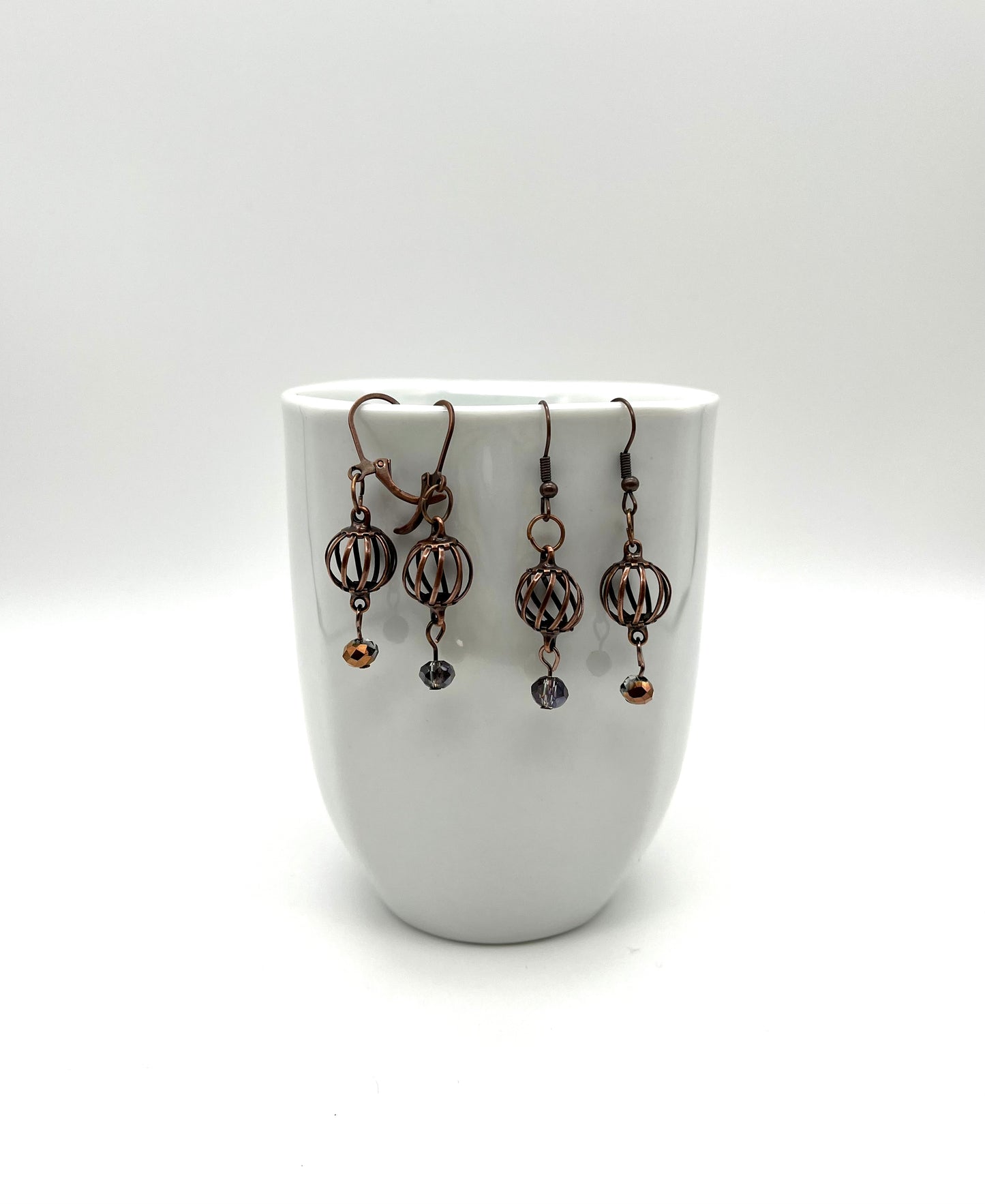 Oxidized copper curve ball earrings