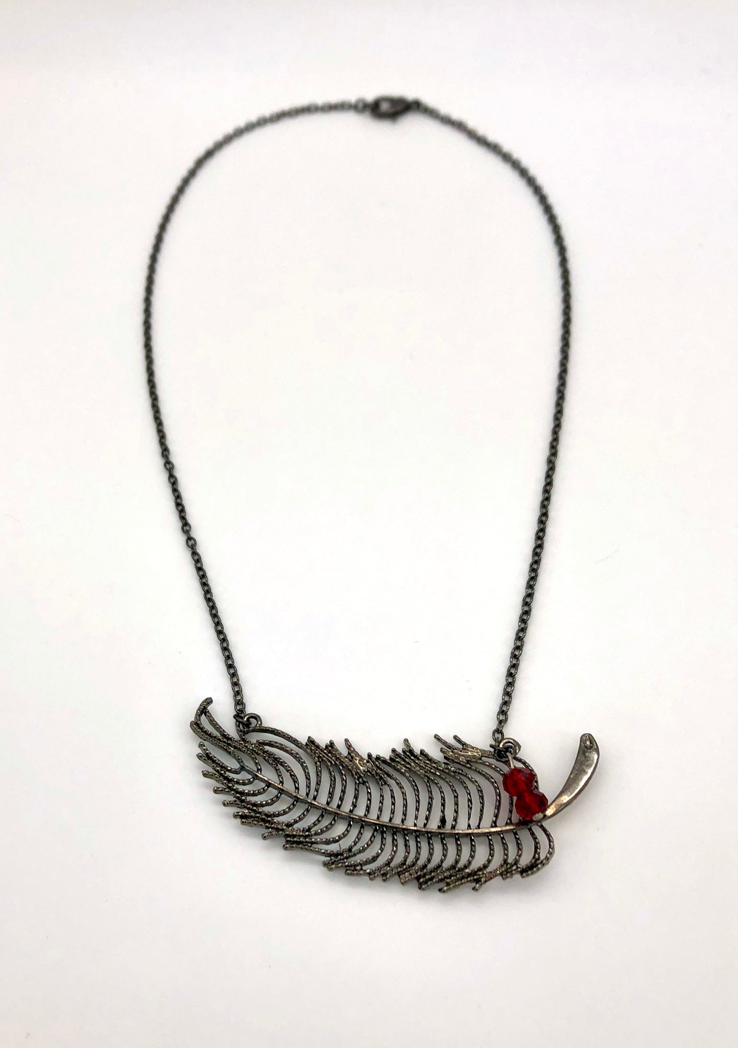 Feather necklace with red bead accents