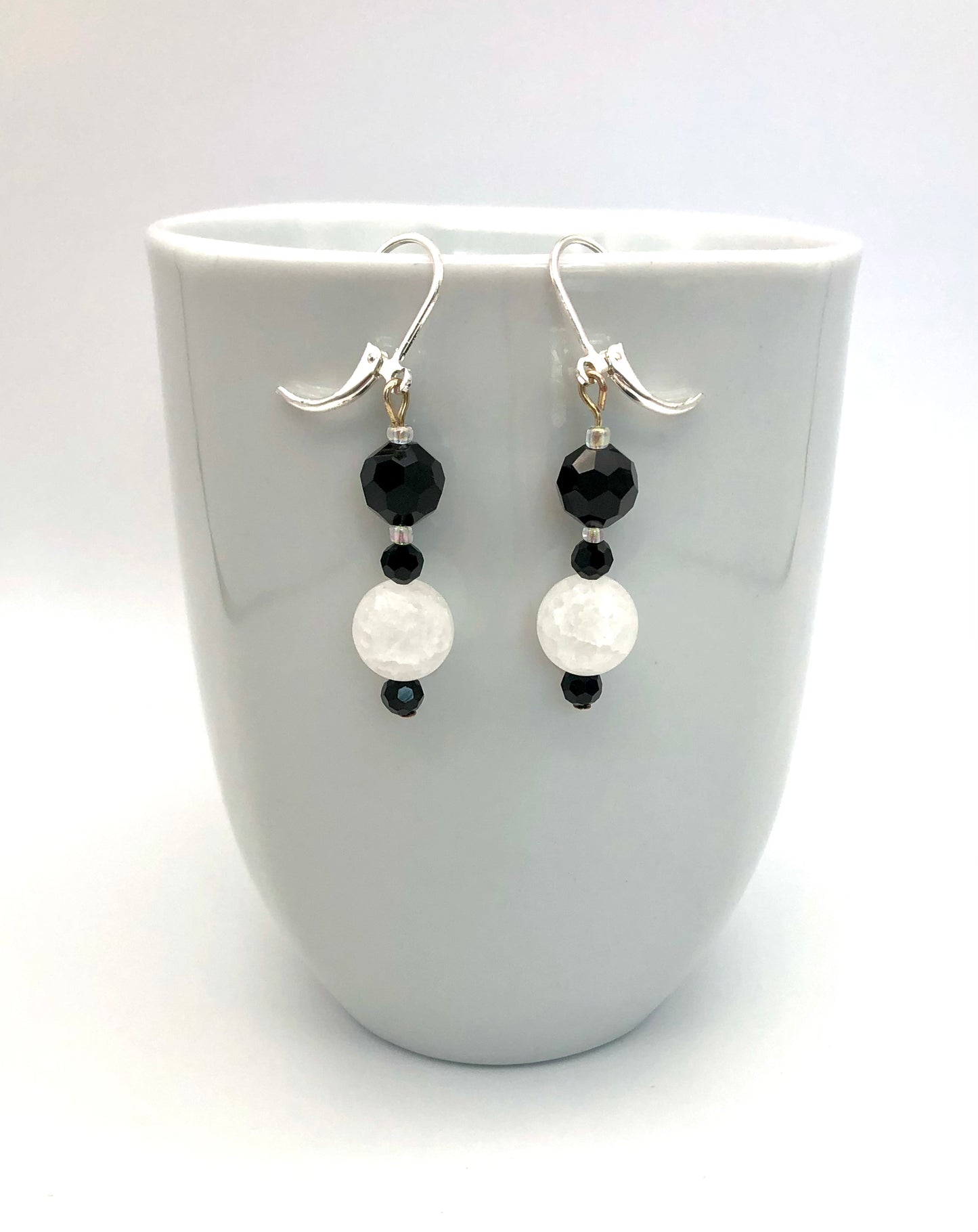 Black faceted and white crackle bead earrings
